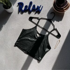 Faux leather cropped, crisscross, top.